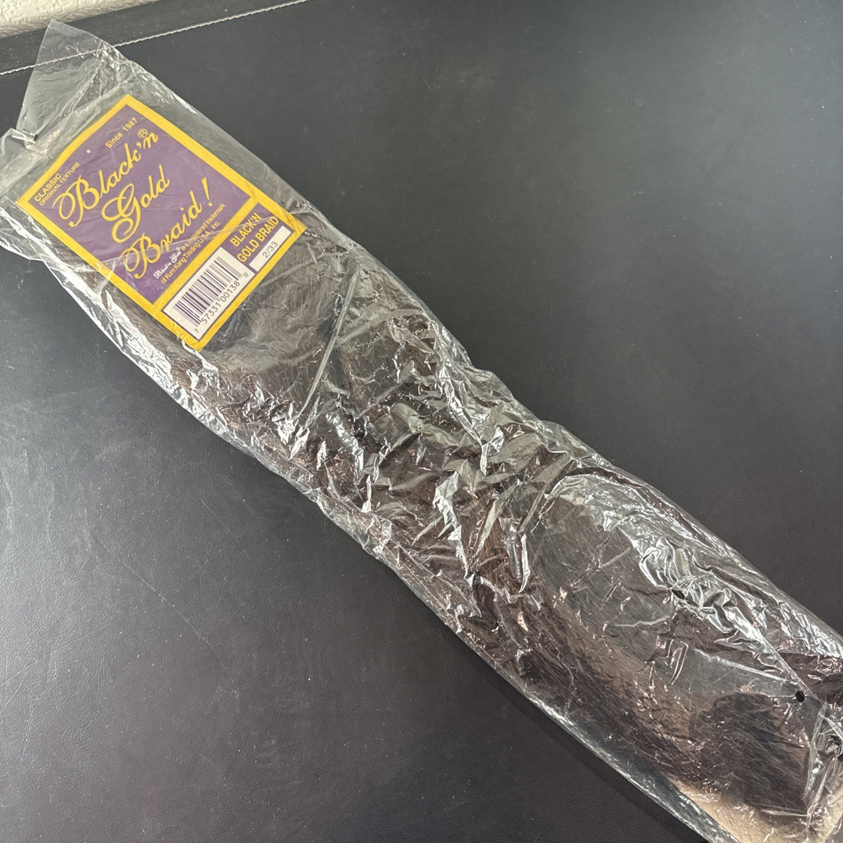 Black 'n Gold Braid 50 inch synthetic hair extension in 1B/M shade