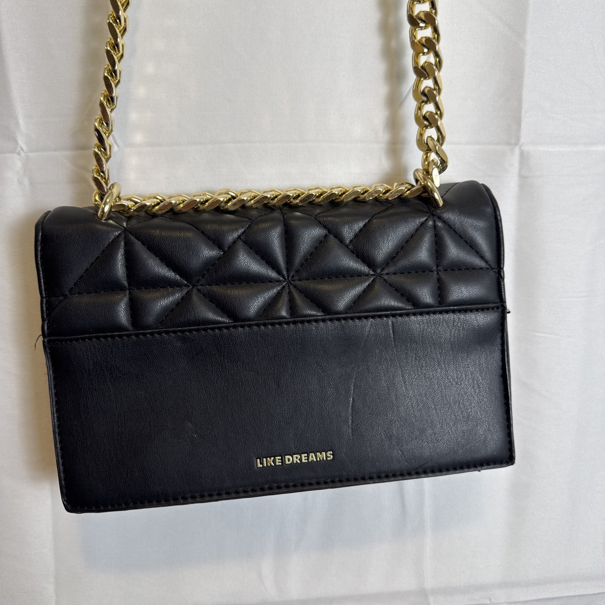 Like Dreams black quilted vegan leather crossbody bag with gold chain accent