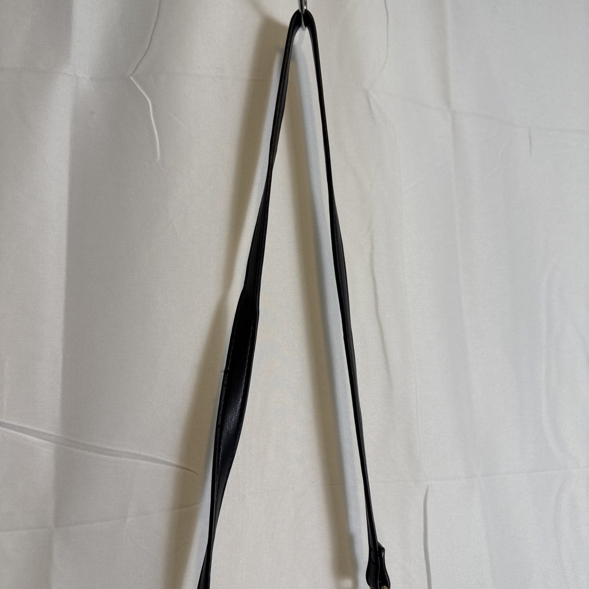 Like Dreams black quilted vegan leather crossbody bag with gold chain accent