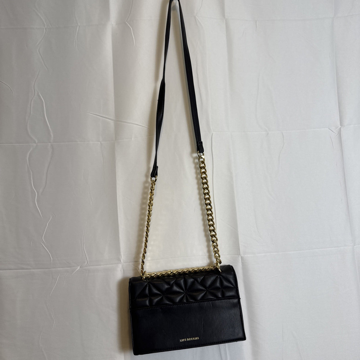 Like Dreams black quilted vegan leather crossbody bag with gold chain accent