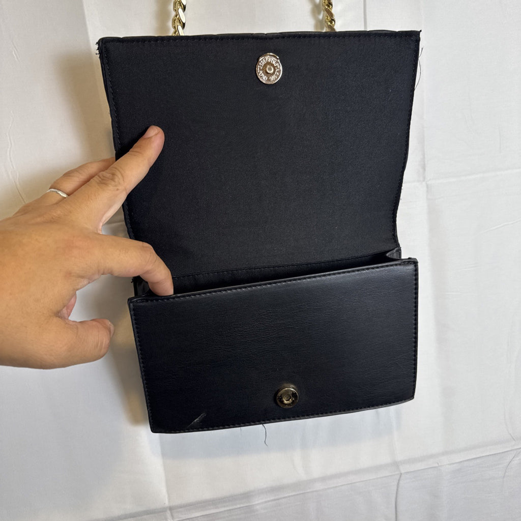Like Dreams black quilted vegan leather crossbody bag with gold chain accent