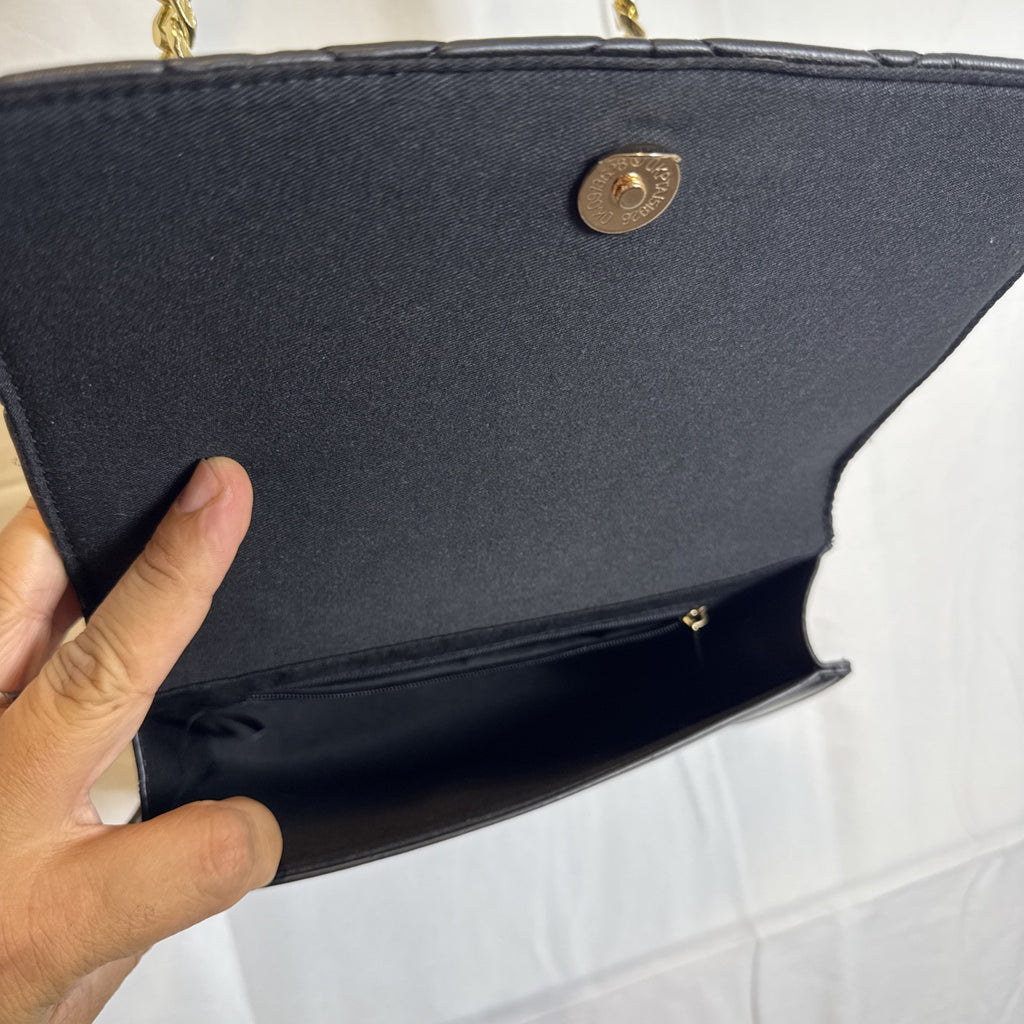 Like Dreams black quilted vegan leather crossbody bag with gold chain accent