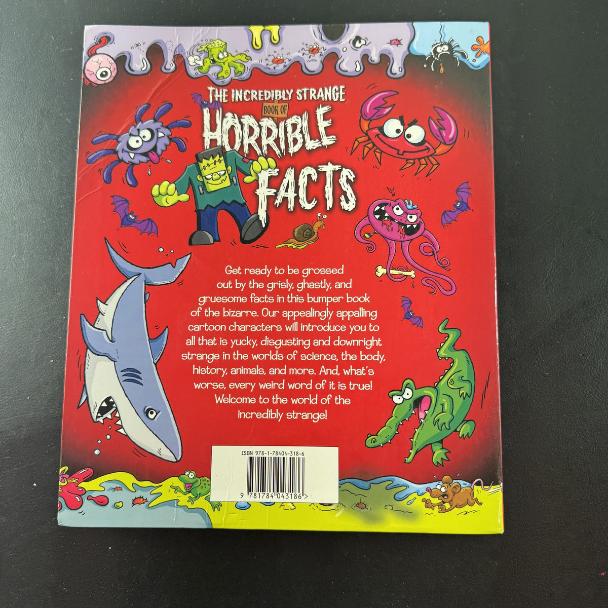 Front cover of The Incredibly Strange Book of Horrible Facts hardcover children's trivia book by Arcturus Publishing.