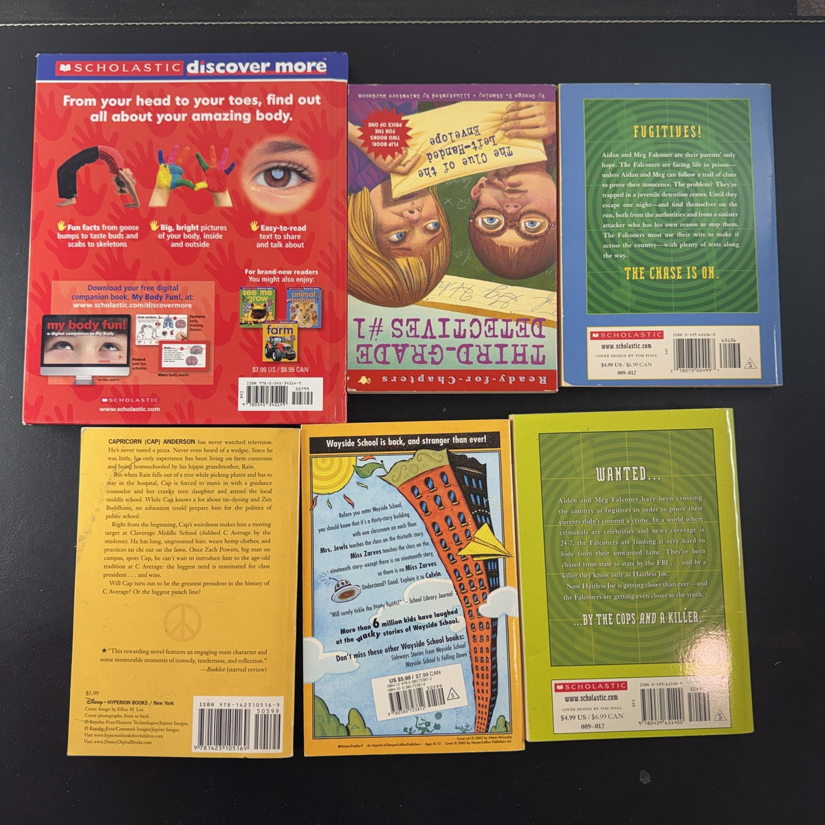 Curated lot of 6 kids adventure and humor books including Gordon Korman and Louis Sachar titles