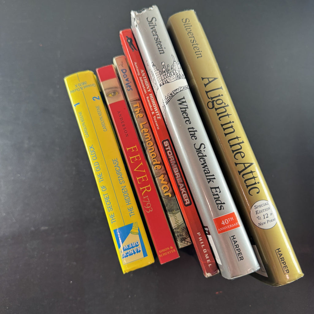 Stack of 6 children's and young adult books including Shel Silverstein poetry and Nancy Drew mystery.
