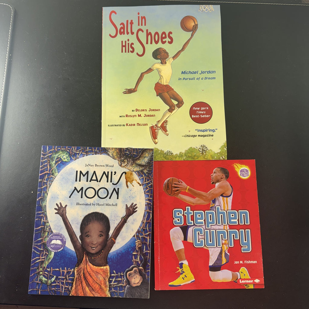 Set of 3 pre-owned children's paperback books including Salt in His Shoes, Stephen Curry, and Imani's Moon