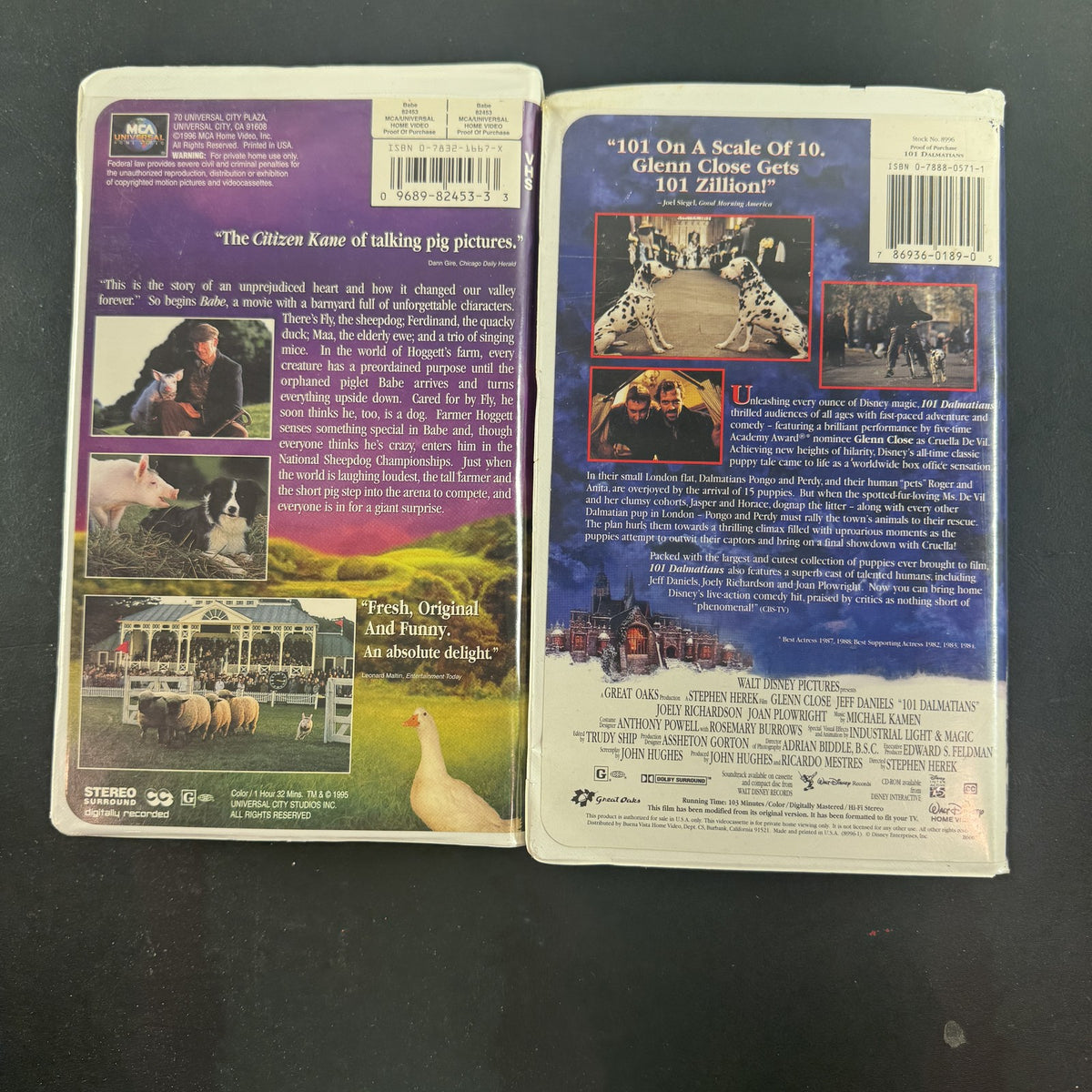 101 Dalmatians and Babe VHS movie tape lot featuring Disney live-action film and MCA Universal release