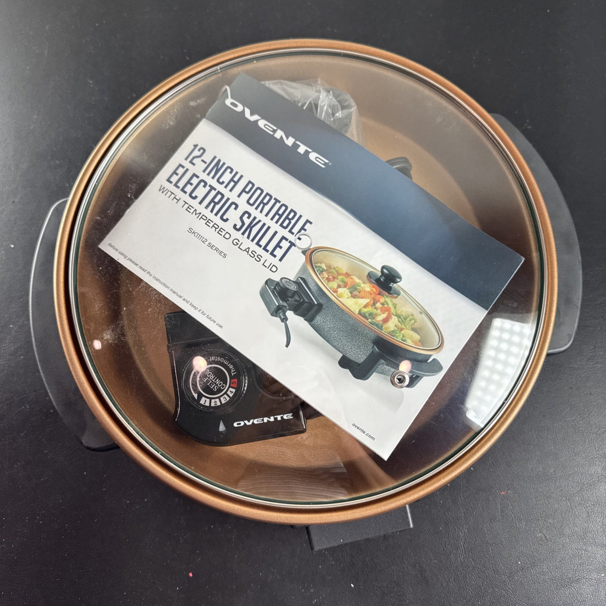 Black OVENTE 12-inch non-stick electric skillet model SK11112