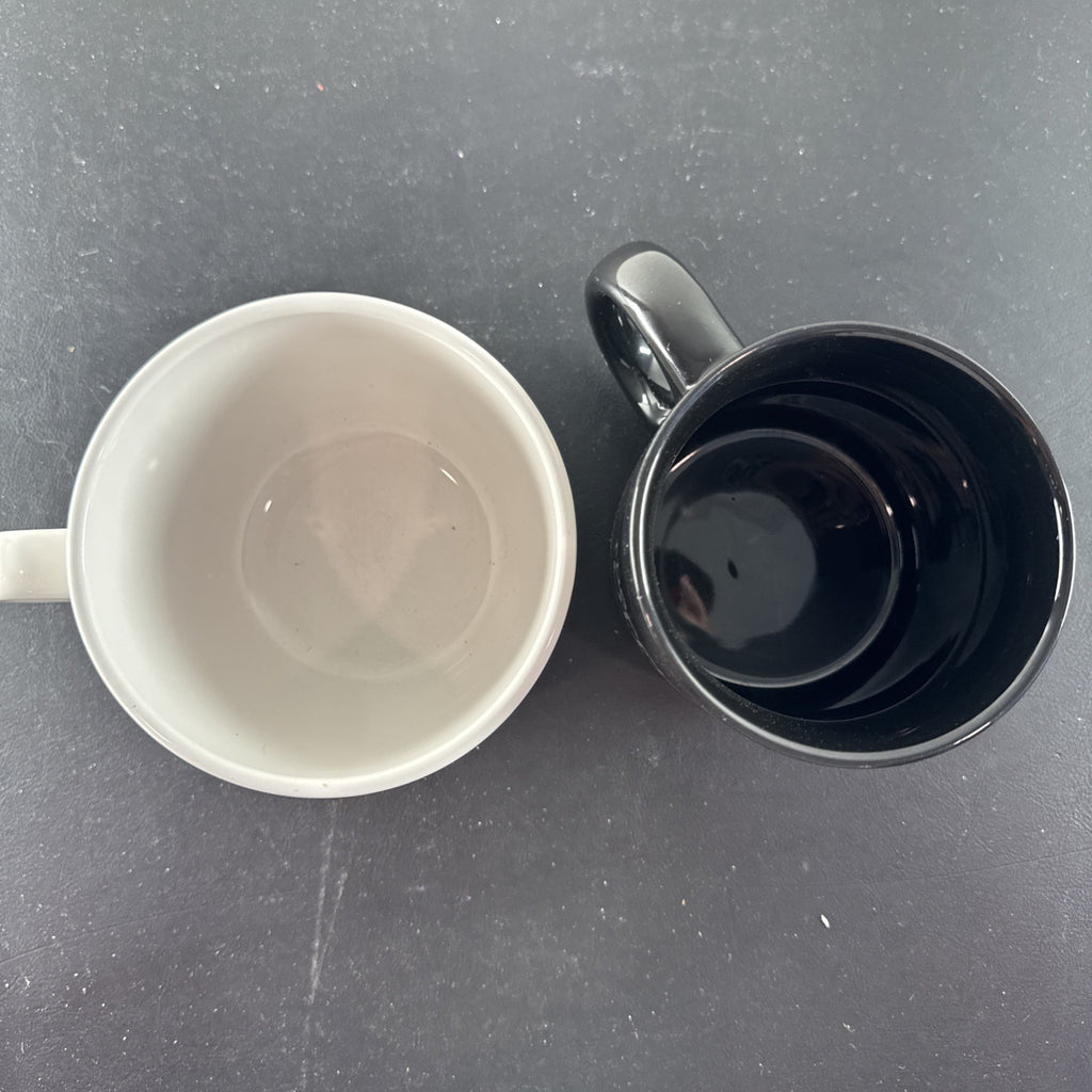 Set of 2 television show coffee mugs featuring Friends Central Perk jumbo mug and The Office Dwight Schrute black mug.