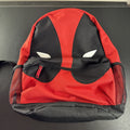 Official Marvel Deadpool red and black character backpack featuring the iconic eye mask design.
