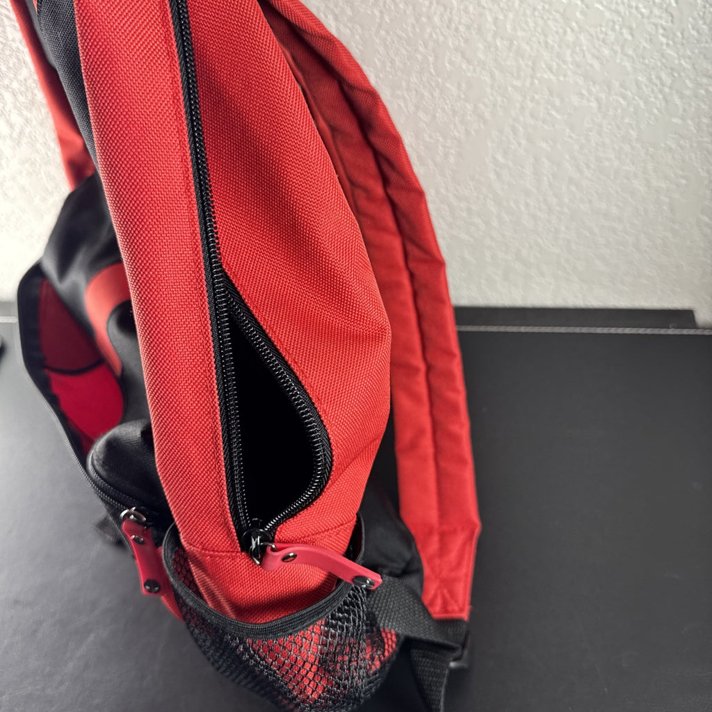 Official Marvel Deadpool red and black character backpack featuring the iconic eye mask design.