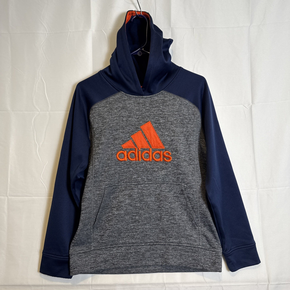 adidas youth size Large gray fleece pullover hoodie with dark blue and orange accents and stitched logo