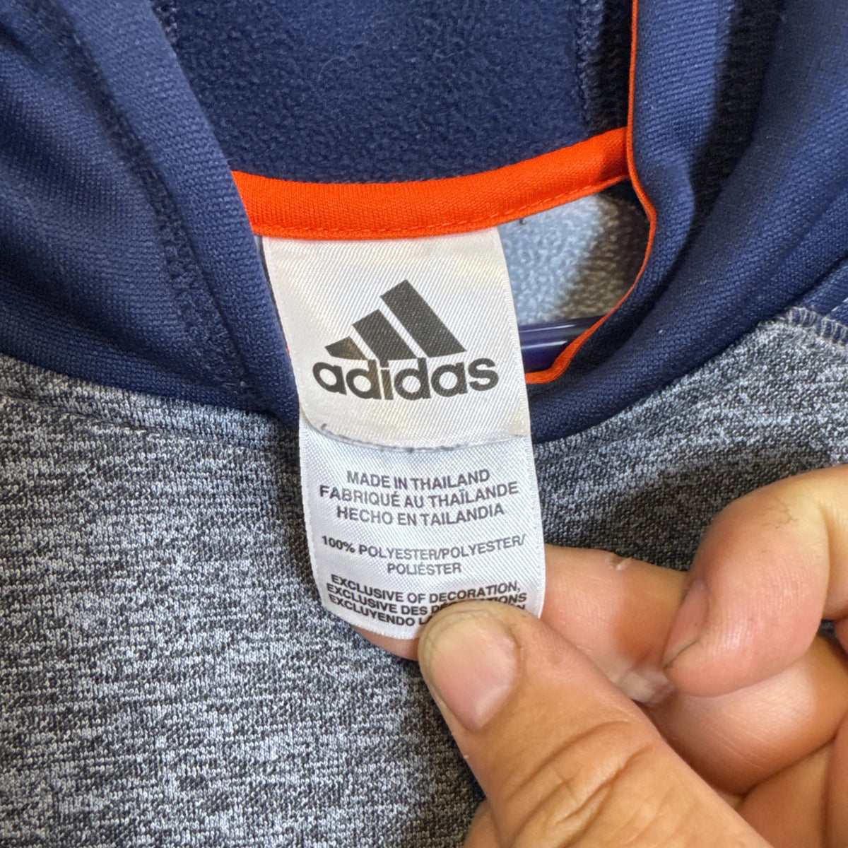 adidas youth size Large gray fleece pullover hoodie with dark blue and orange accents and stitched logo