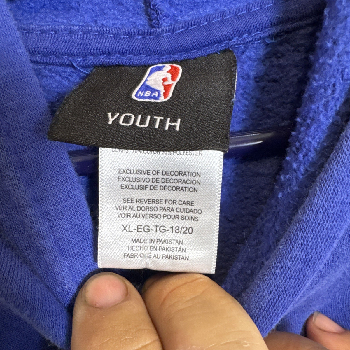 Front view of a pre-owned blue Golden State Warriors NBA pullover hoodie in Boys size XL.