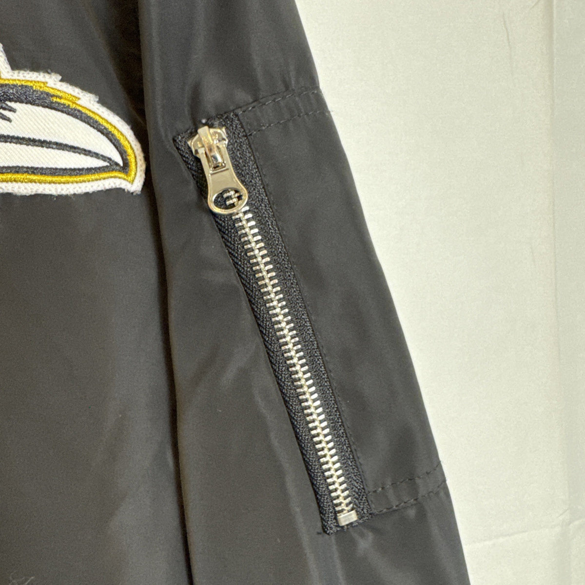 Fanatics Baltimore Ravens black full-zip bomber jacket with embroidered chest logo, men's size Small