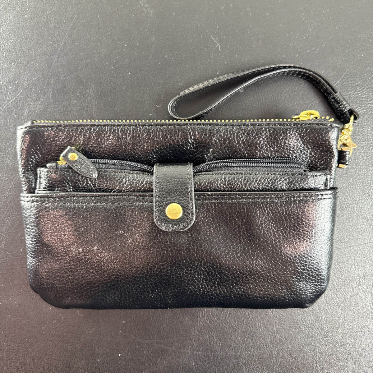LODIS black pebbled leather wristlet clutch and matching card wallet set with gold-tone hardware.