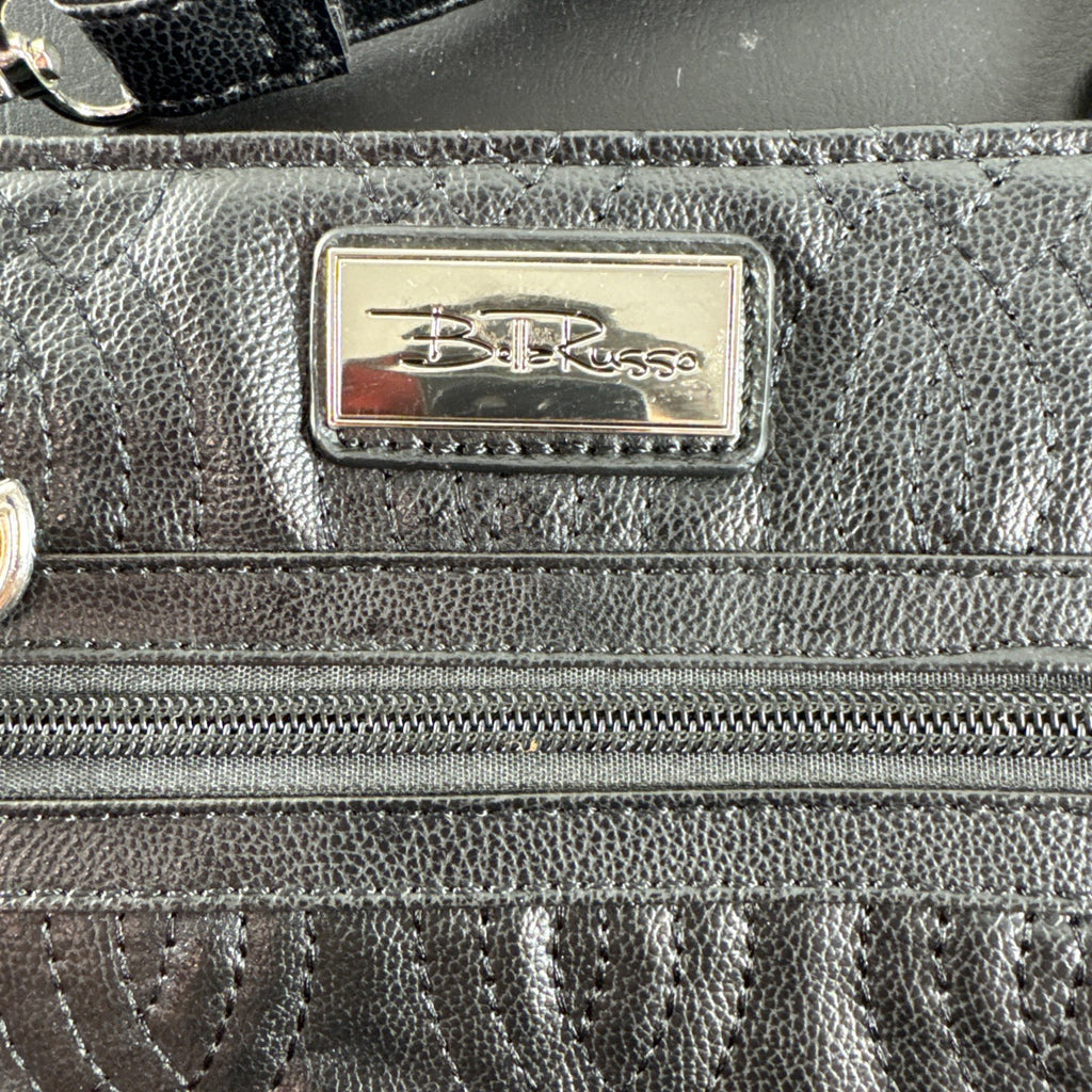 Bella Russo black quilted faux leather crossbody bag with silver-tone heart zipper pull.