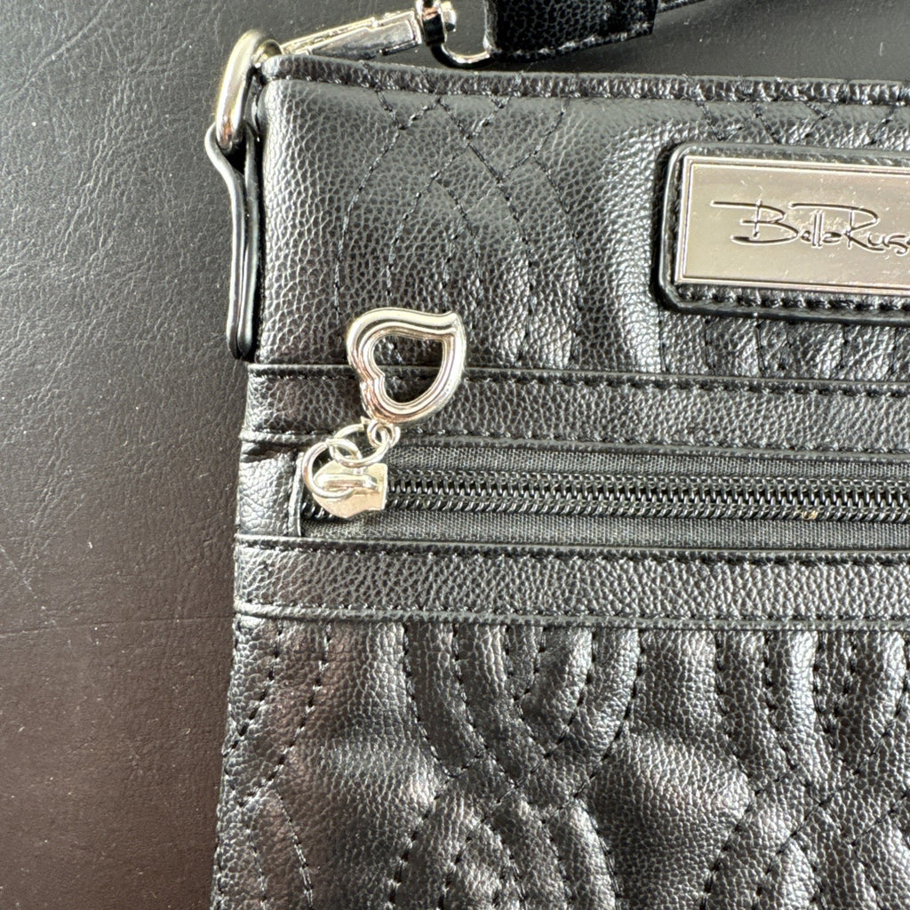 Bella Russo black quilted faux leather crossbody bag with silver-tone heart zipper pull.