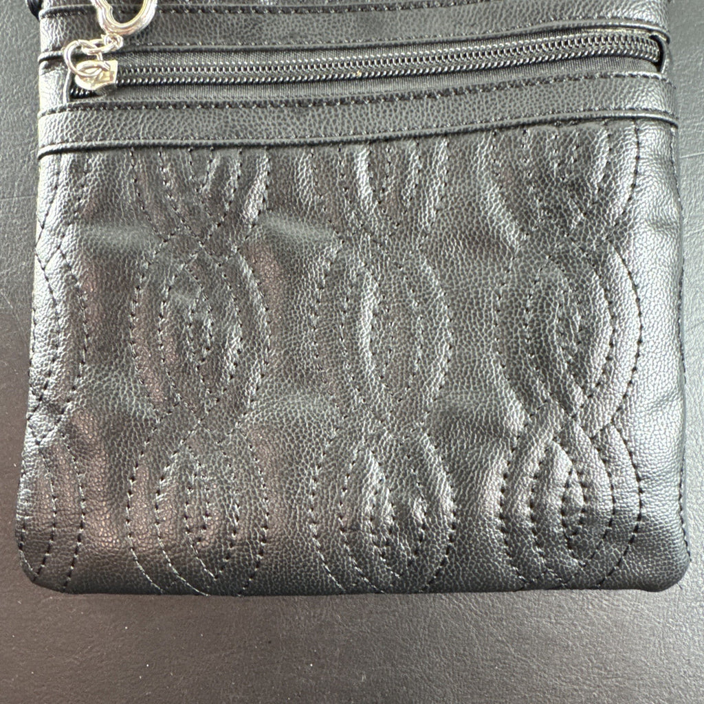 Bella Russo black quilted faux leather crossbody bag with silver-tone heart zipper pull.