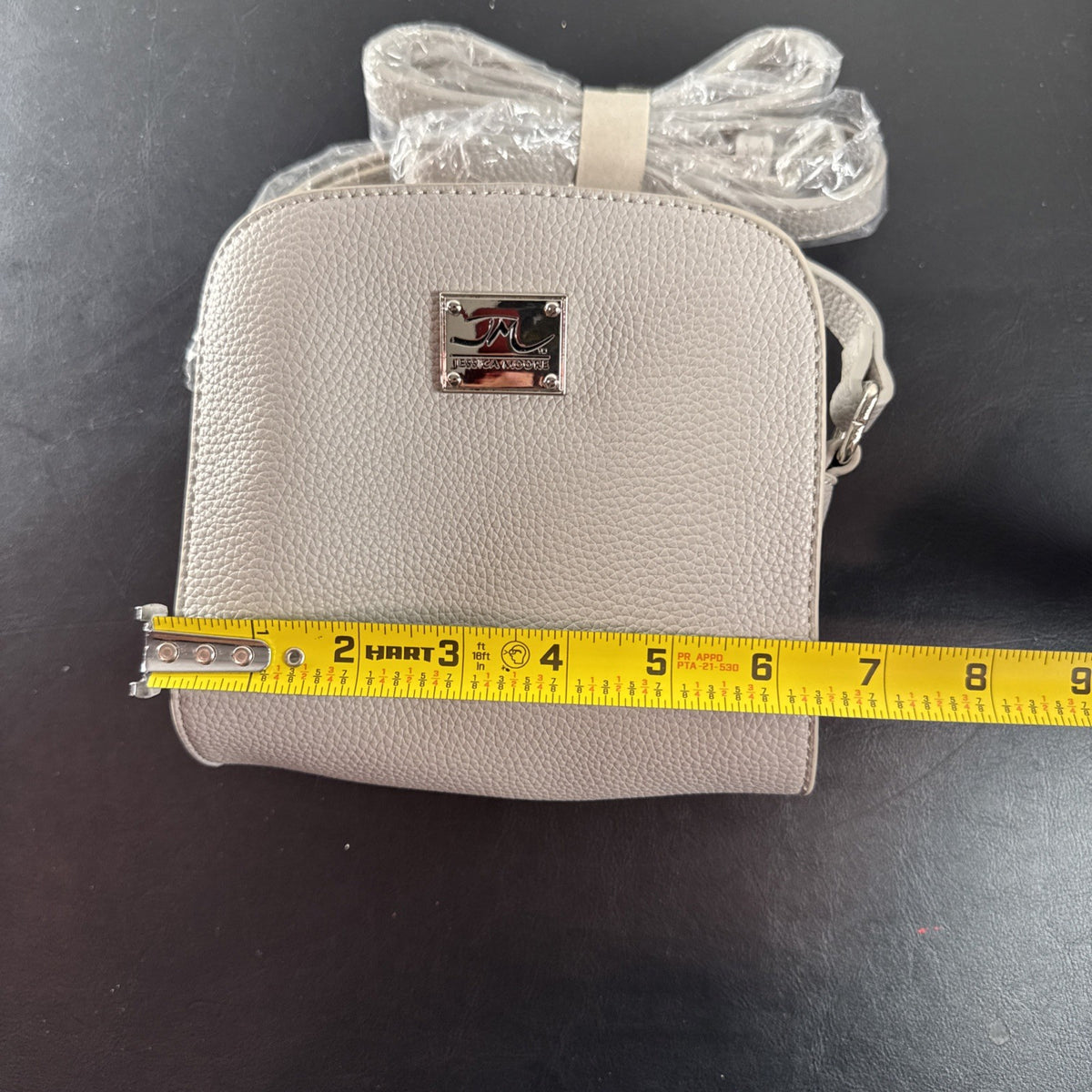Jessica Moore light gray pebbled faux leather small crossbody bag with silver hardware