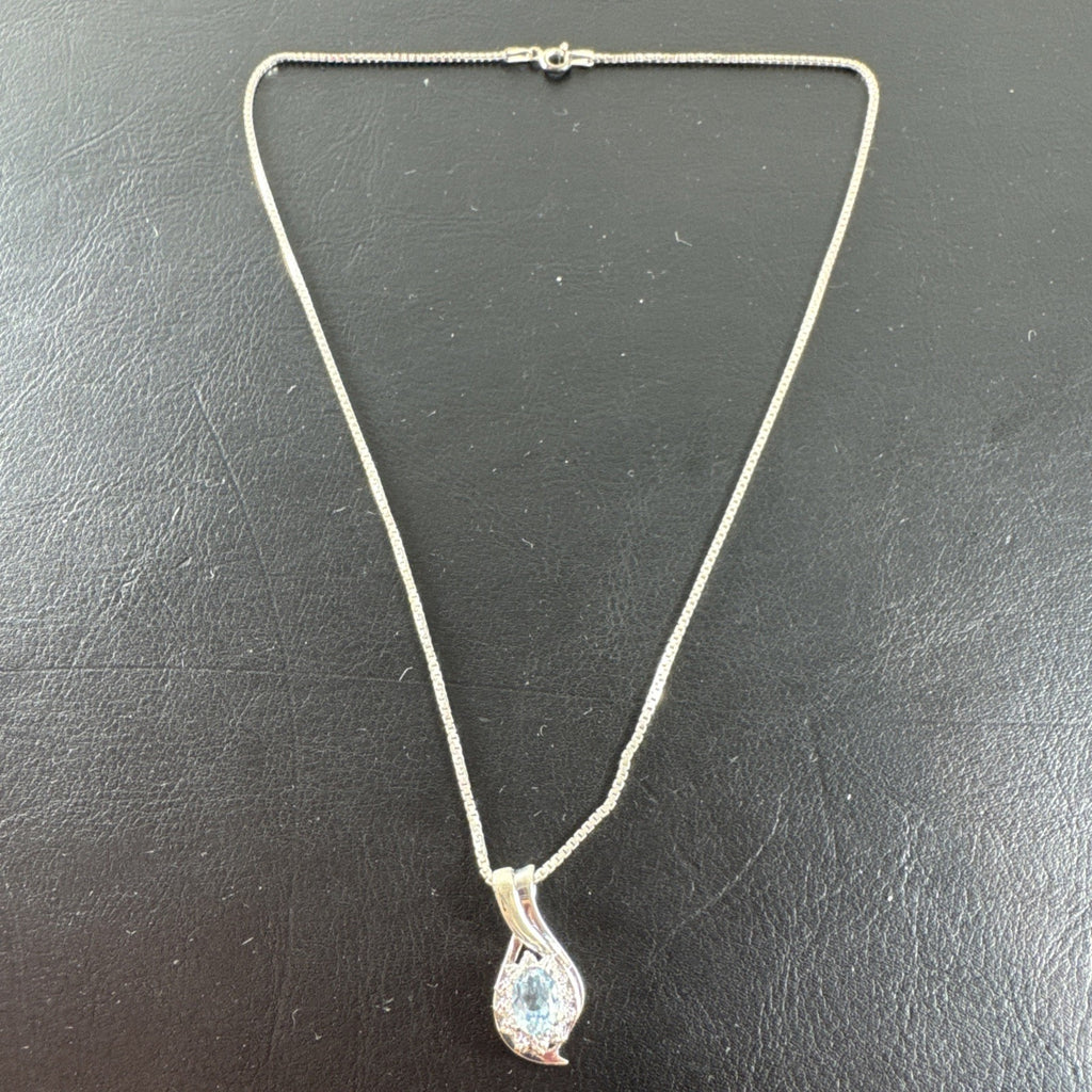 Solid 925 sterling silver teardrop swirl pendant with a light blue oval stone on an Italian box chain.