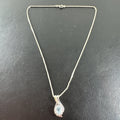 Solid 925 sterling silver teardrop swirl pendant with a light blue oval stone on an Italian box chain.