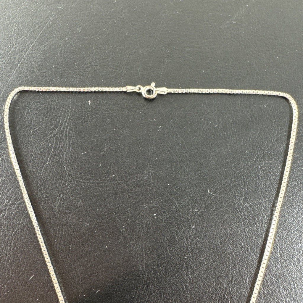 Solid 925 sterling silver teardrop swirl pendant with a light blue oval stone on an Italian box chain.