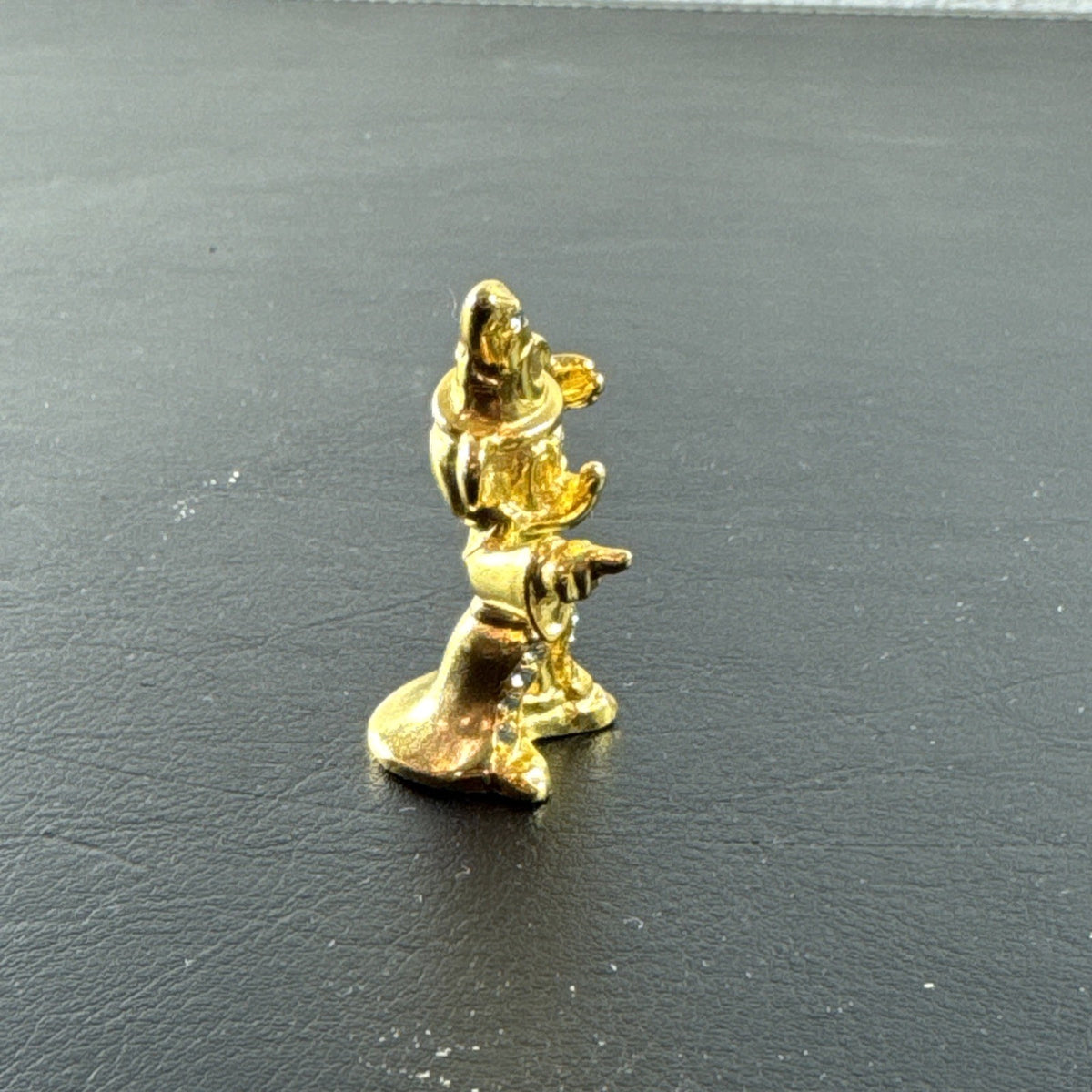 Vintage Disney Sorcerer Mickey Mouse gold tone miniature figurine with crystal accents