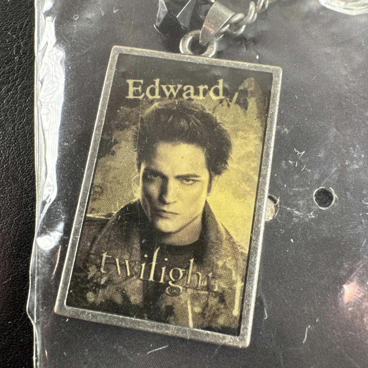 NECA Twilight Edward Cullen silver-tone alloy charm necklace, brand new with tags.