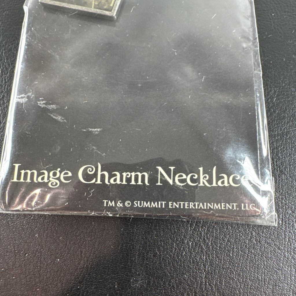 NECA Twilight Edward Cullen silver-tone alloy charm necklace, brand new with tags.