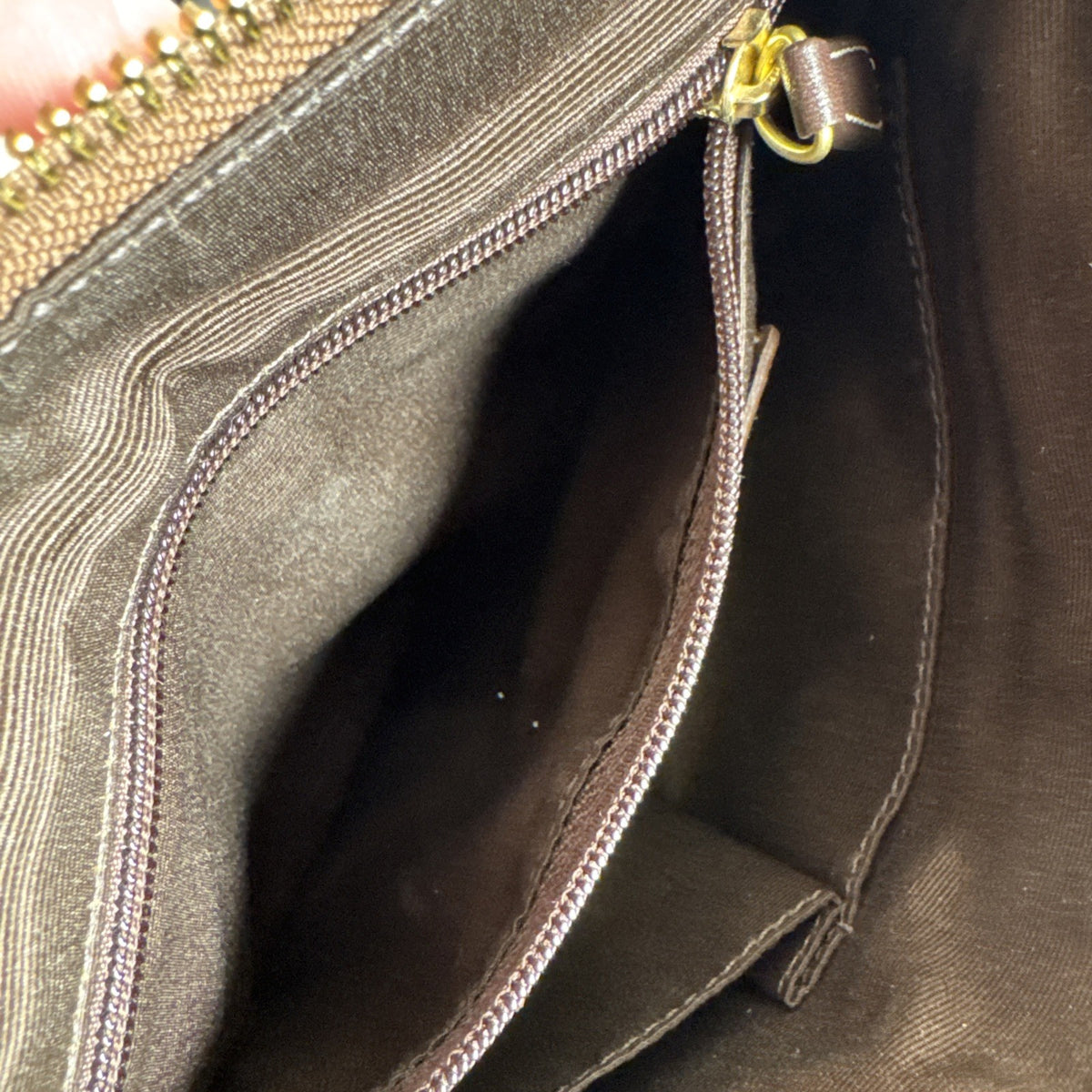 Coach khaki and brown signature jacquard canvas file crossbody bag with leather trim and gold-tone hardware.