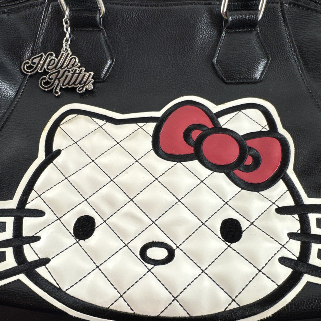 Hello Kitty black faux leather satchel bag with quilted character applique and silver logo charm