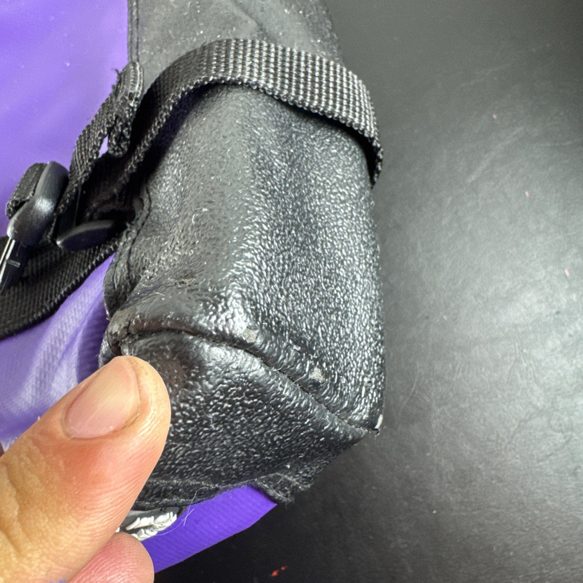 Superdry Tarp Tech messenger bag in purple tarpaulin with yellow kanji graphics