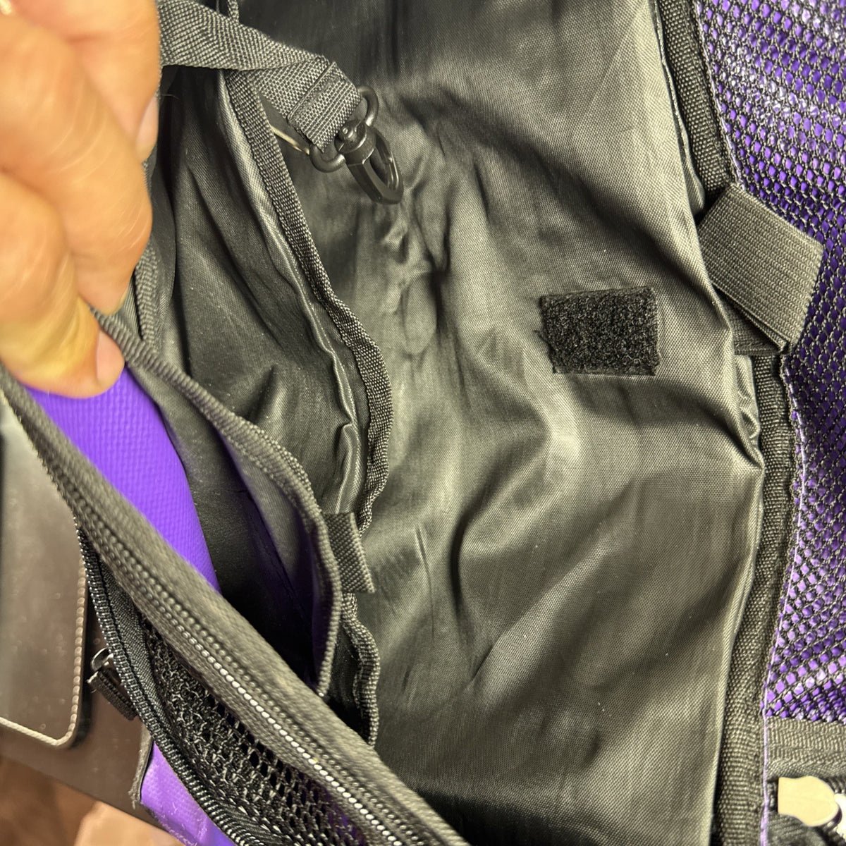 Purple and yellow Superdry tarp messenger bag with bold logo spellout and padded shoulder strap.