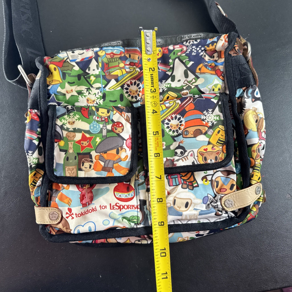 Tokidoki x LeSportsac Vacanze winter print crossbody messenger bag featuring colorful characters and front pockets