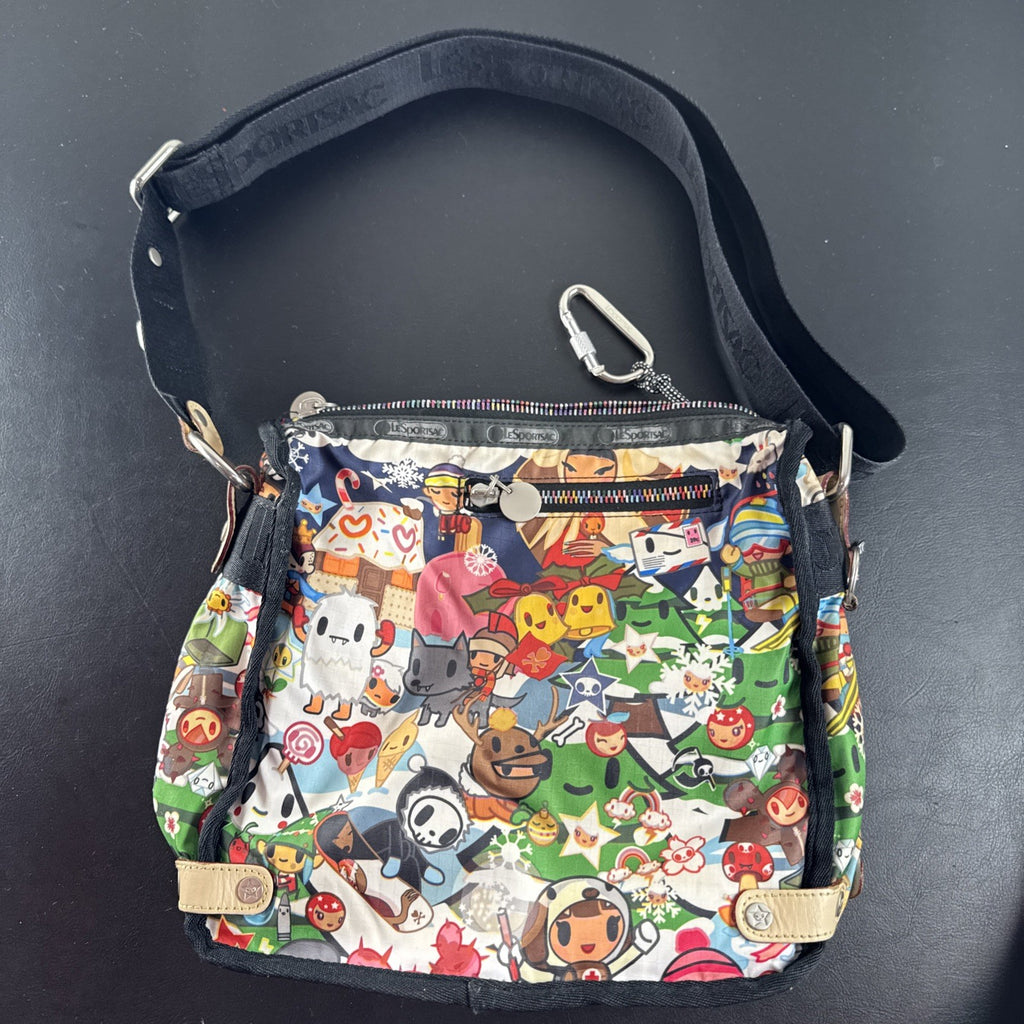 Tokidoki x LeSportsac Vacanze winter print crossbody messenger bag featuring colorful characters and front pockets