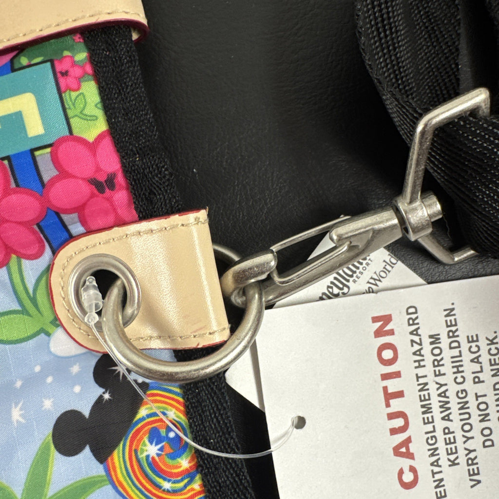 NWT Disney Parks convertible foldover crossbody tote bag in blue park map print with rainbow zipper front pocket.