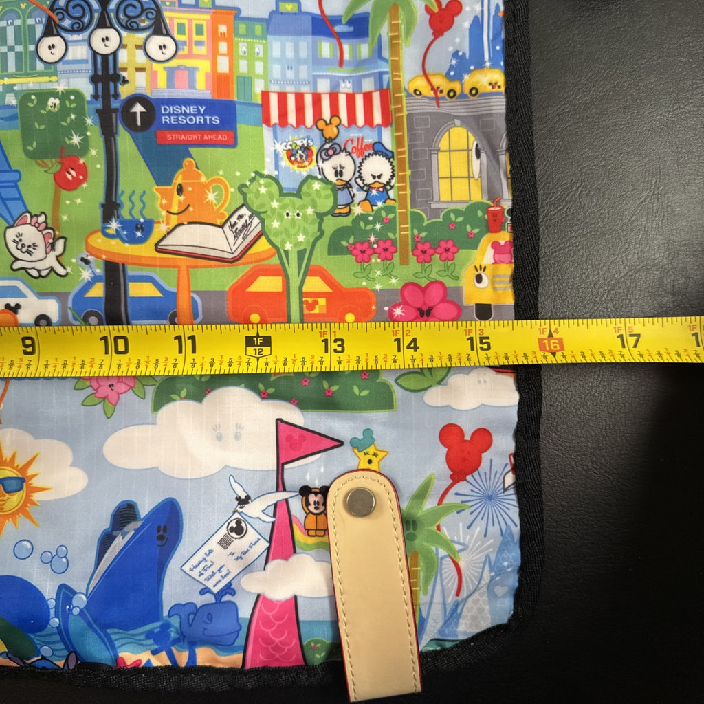 NWT Disney Parks convertible foldover crossbody tote bag in blue park map print with rainbow zipper front pocket.