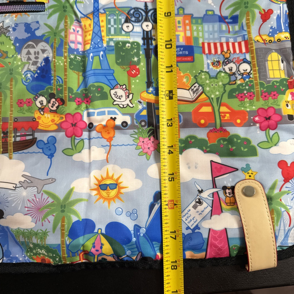 NWT Disney Parks convertible foldover crossbody tote bag in blue park map print with rainbow zipper front pocket.