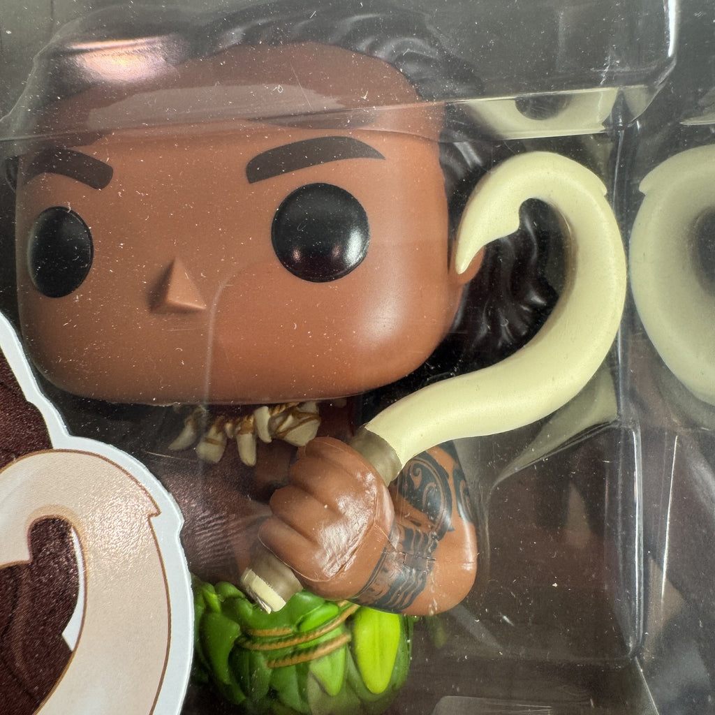 Funko Pop! Disney Moana Maui #214 vinyl figure in original window box packaging.