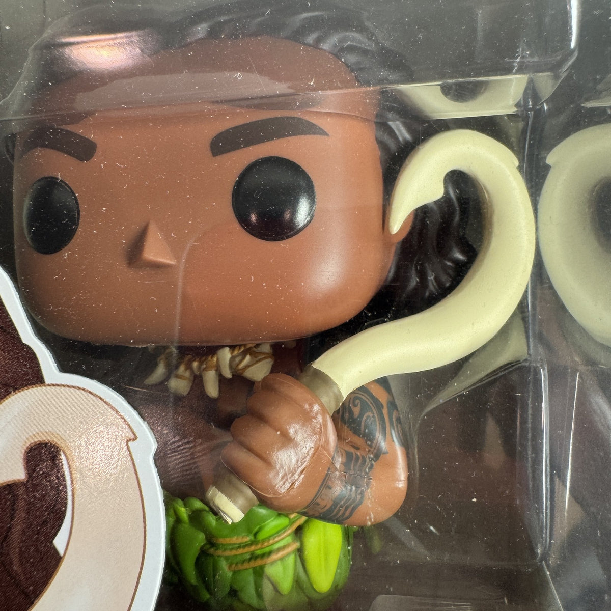 Funko Pop! Disney Moana Maui #214 vinyl figure in original window box packaging.