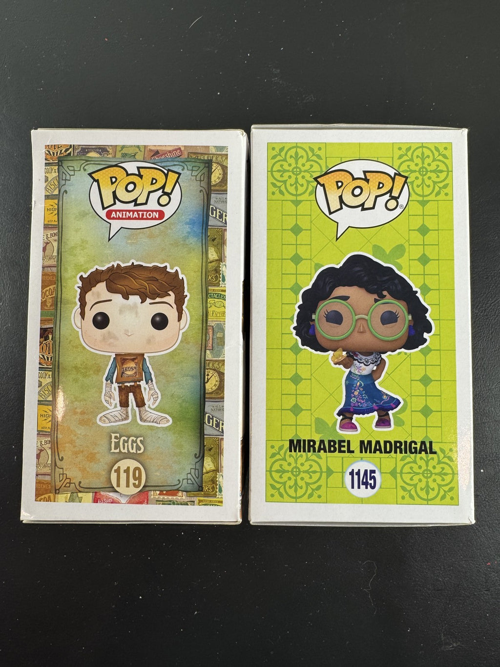 Funko Pop 2-pack set featuring Disney Encanto Mirabel #1145 and Laika The Boxtrolls Eggs #119 vinyl figures in boxes.