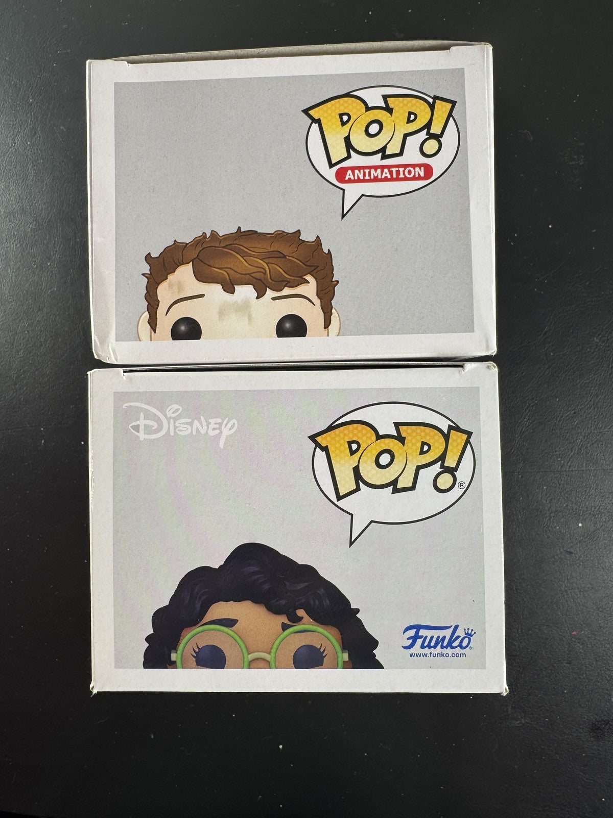 Funko Pop 2-pack set featuring Disney Encanto Mirabel #1145 and Laika The Boxtrolls Eggs #119 vinyl figures in boxes.
