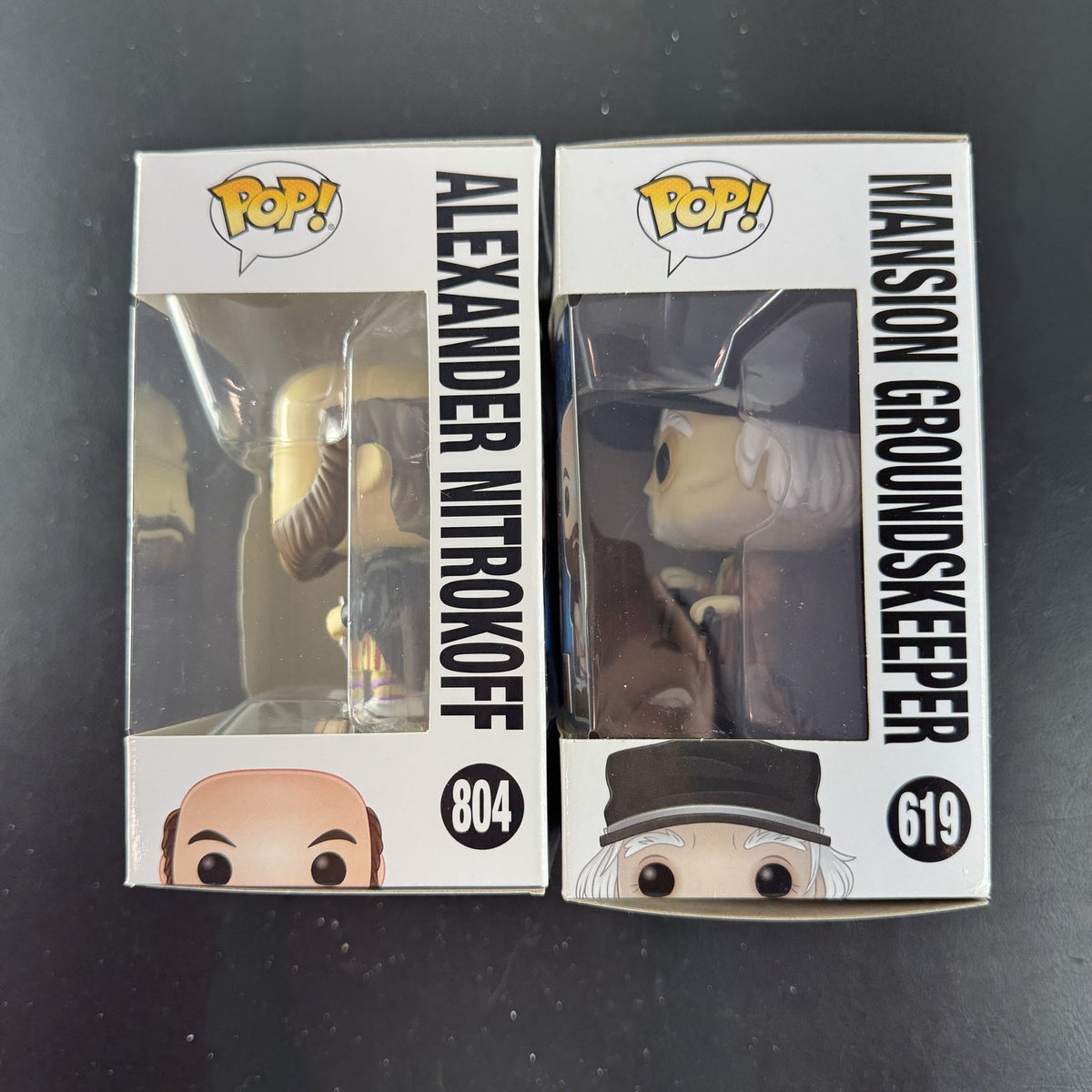 Funko Pop Disney The Haunted Mansion 2-figure set featuring Mansion Groundskeeper 619 and Alexander Nitrokoff 804 in boxes