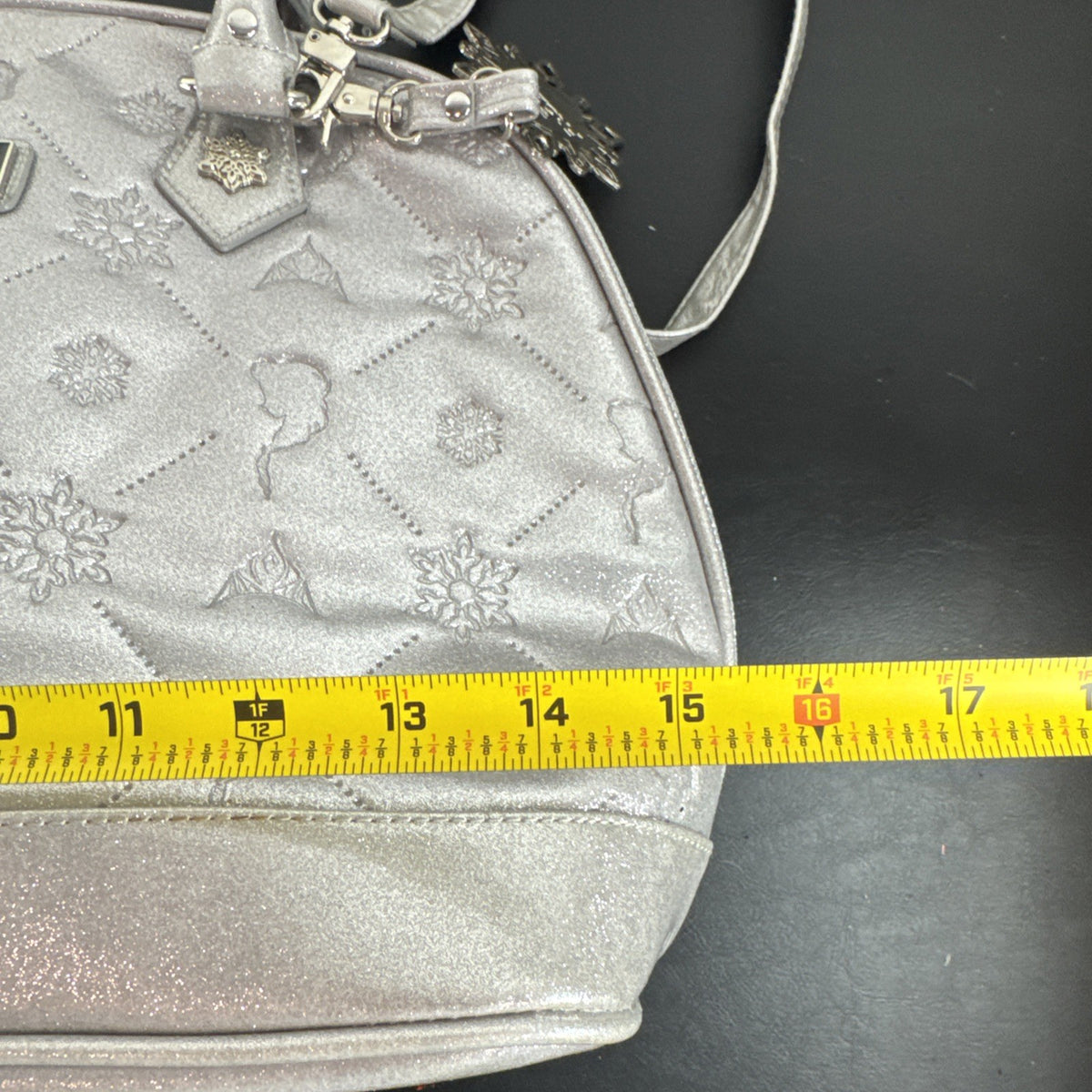 Disney Frozen small silver glitter handbag with a snowflake charm