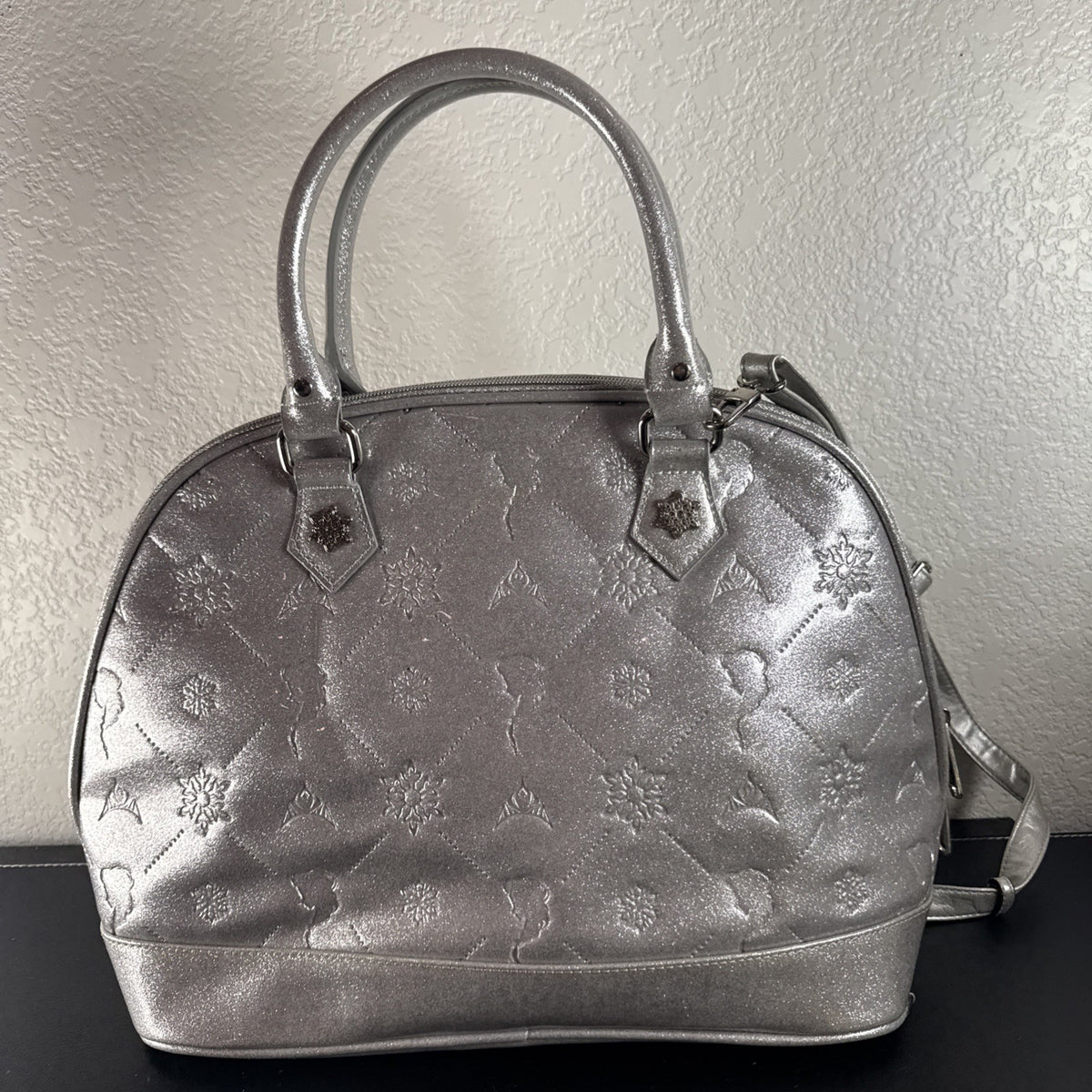 Disney Frozen small silver glitter handbag with a snowflake charm