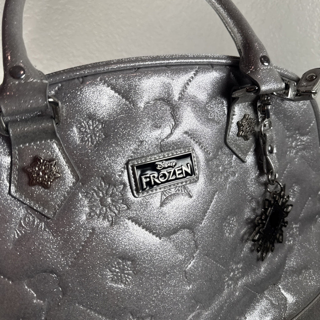 Disney Frozen small silver glitter handbag with a snowflake charm