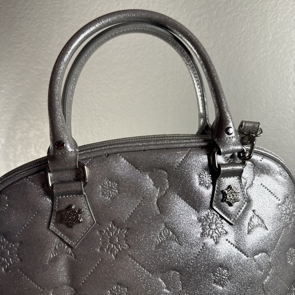 Disney Frozen small silver glitter handbag with a snowflake charm