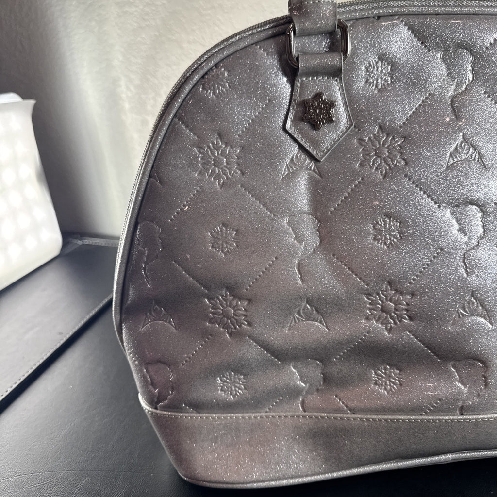 Disney Frozen small silver glitter handbag with a snowflake charm