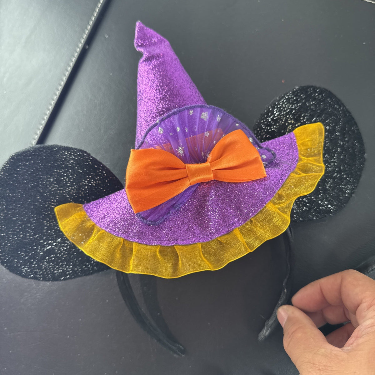 Lot of 3 Disney Parks Minnie Mouse ear headbands including Halloween Witch Hat, Mouseketeer, and Jack Skellington styles.